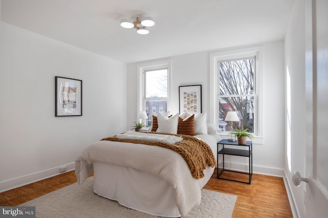 bedroom with light hardwood / wood-style flooring