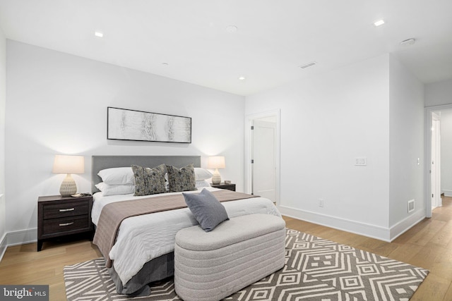 bedroom featuring light hardwood / wood-style floors