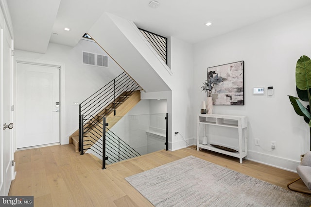 foyer with hardwood / wood-style floors