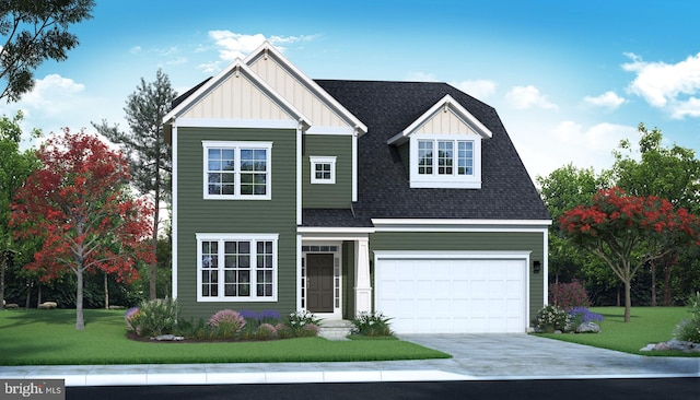 view of front of home featuring a garage and a front lawn