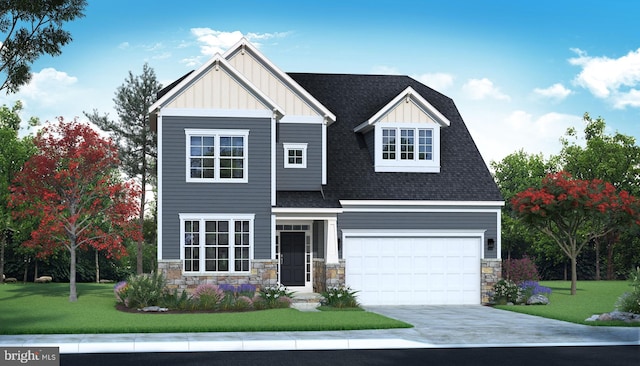 view of front of house featuring a garage and a front yard