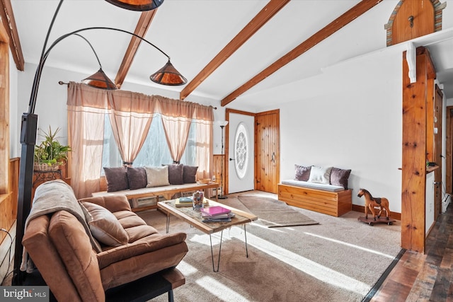 living room featuring vaulted ceiling with beams and dark hardwood / wood-style floors