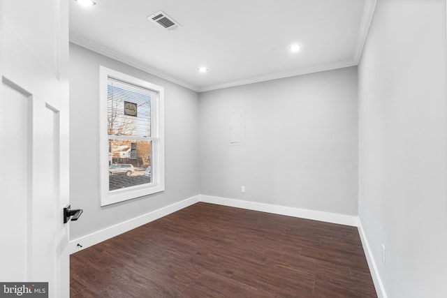 unfurnished room with dark wood-type flooring and ornamental molding