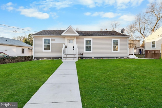 view of front of home with a front yard