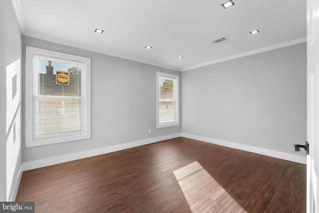 unfurnished room with dark hardwood / wood-style flooring and ornamental molding