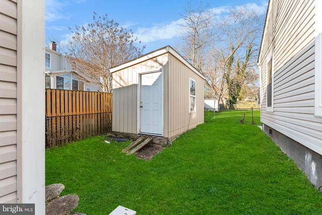 view of yard with a storage unit