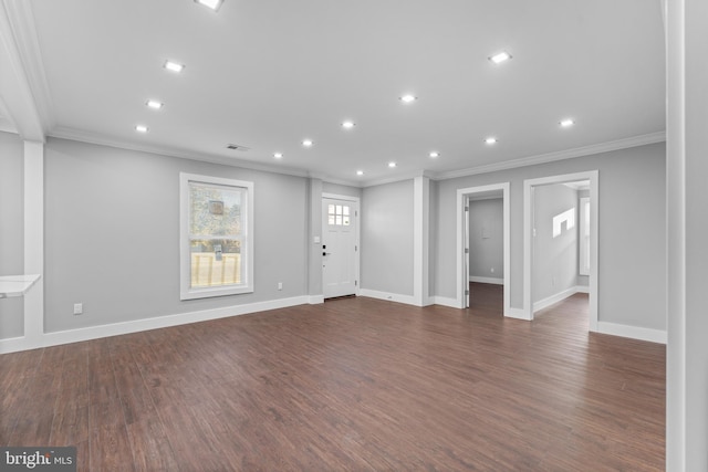 unfurnished living room with ornamental molding and dark wood-type flooring