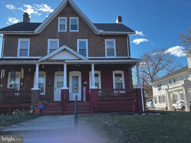 view of front of home featuring covered porch