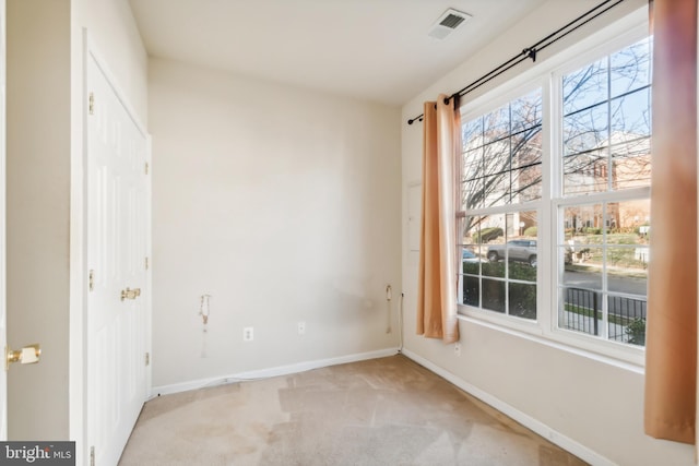 view of carpeted spare room