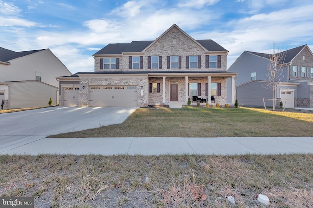 view of front facade featuring a front lawn, a porch, and a garage