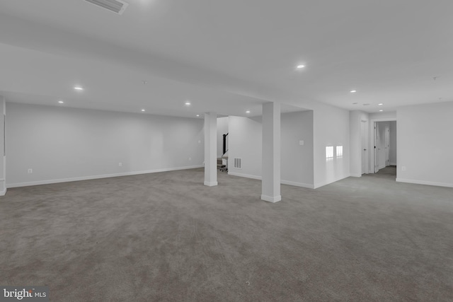 basement with light colored carpet