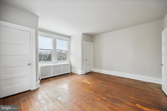 5122 N Broad St, Philadelphia, PA 19141 - unfurnished bedroom featuring radiator and hardwood / wood-style flooring