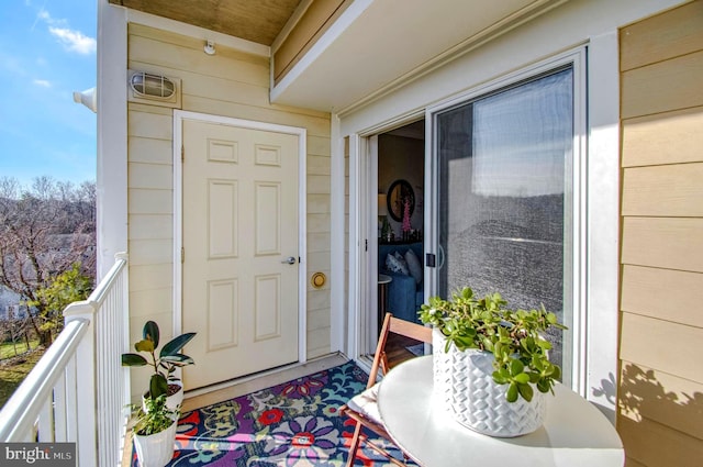 doorway to property with a balcony