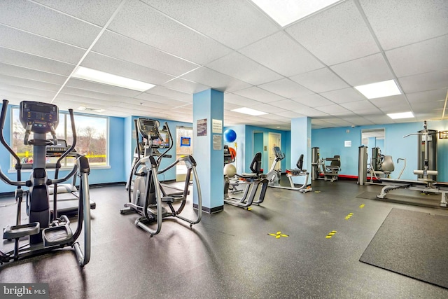 workout area with a drop ceiling