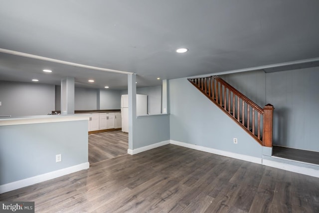 unfurnished living room with hardwood / wood-style floors