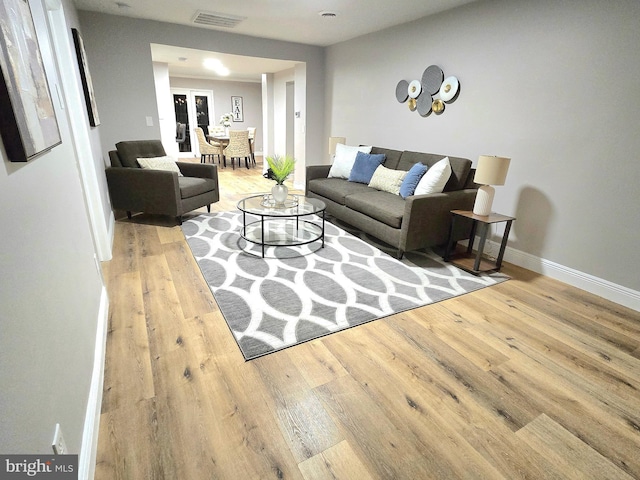 living room featuring light wood-type flooring