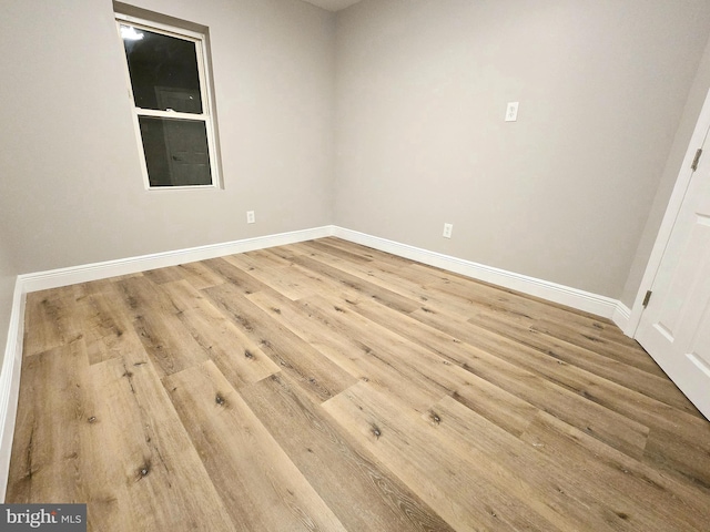 empty room featuring hardwood / wood-style floors