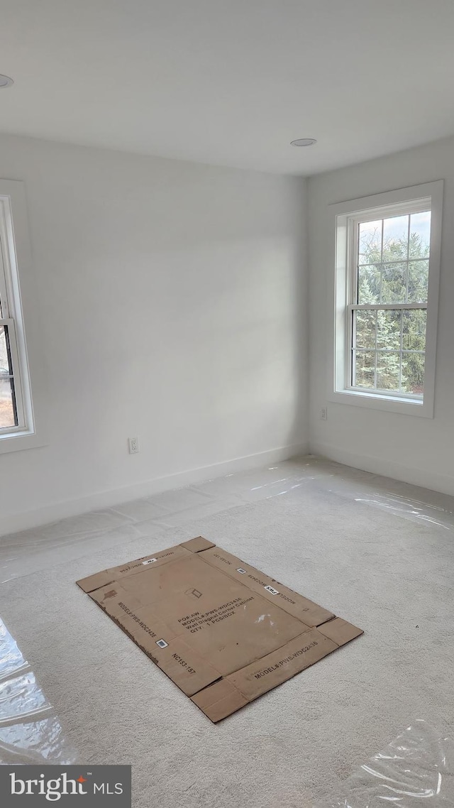 view of carpeted spare room