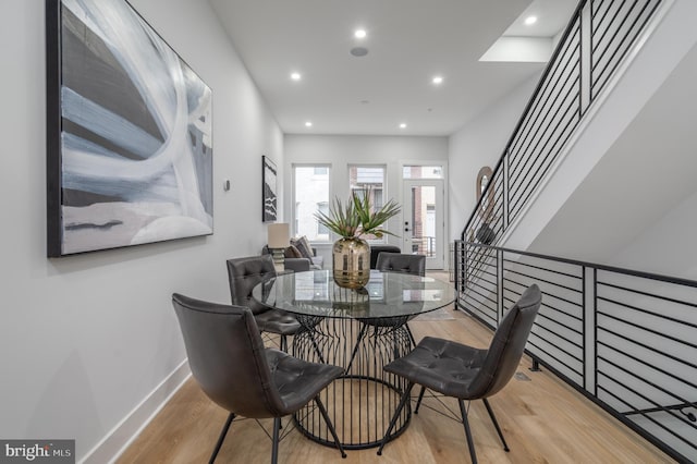 dining space featuring light hardwood / wood-style flooring