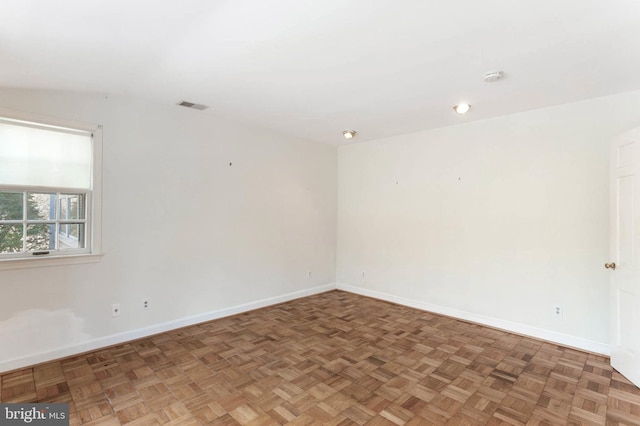 empty room with parquet floors