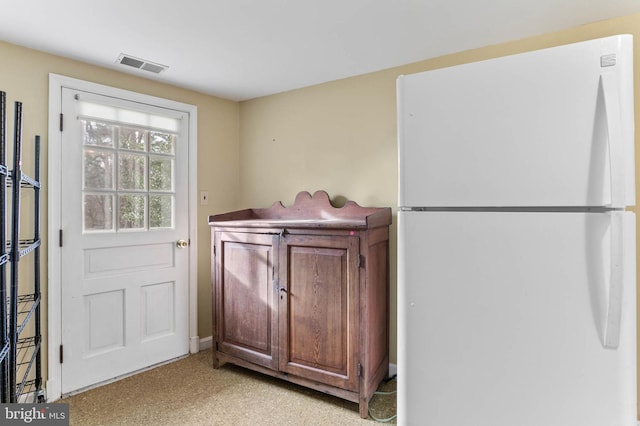 kitchen with white fridge