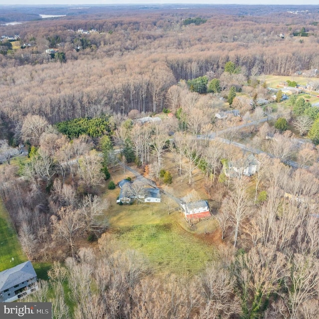 birds eye view of property with a rural view