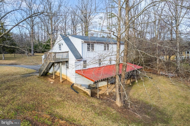 back of house with a wooden deck