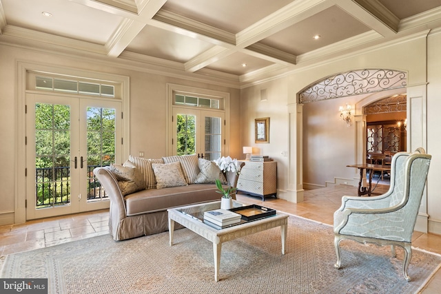 sunroom with french doors, coffered ceiling, and beamed ceiling