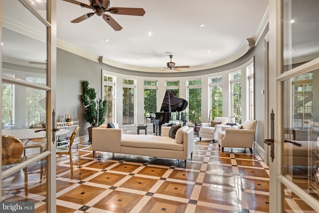 sunroom with french doors and ceiling fan