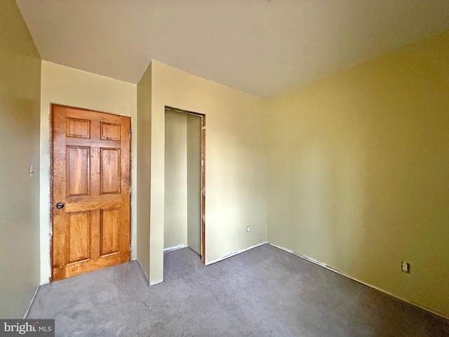 unfurnished bedroom with light carpet