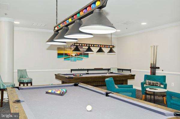 recreation room with pool table, ornamental molding, and recessed lighting