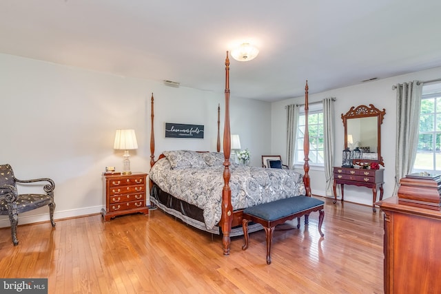 bedroom with hardwood / wood-style flooring