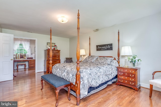 bedroom featuring hardwood / wood-style floors