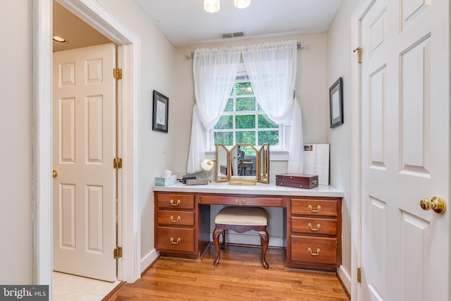 office space featuring light wood-type flooring