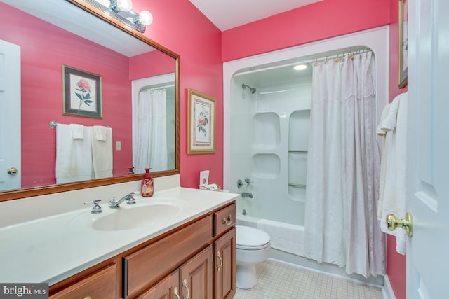 full bathroom with tile patterned flooring, vanity, toilet, and shower / tub combo