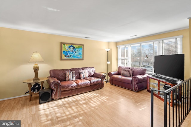 1022 Tyler Ave, Annapolis, MD 21403 - living room featuring light wood-style floors and baseboards