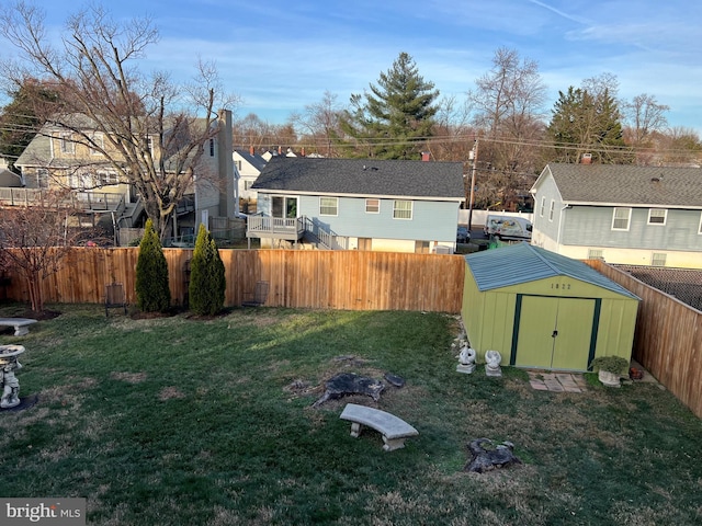 view of yard with a storage unit