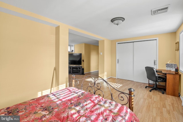 1022 Tyler Ave, Annapolis, MD 21403 - bedroom with wood finished floors, a closet, and an office area