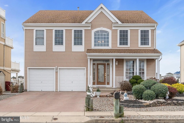 view of front of property with a garage