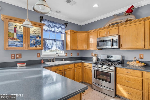 kitchen with sink, appliances with stainless steel finishes, decorative light fixtures, light tile patterned flooring, and ornamental molding