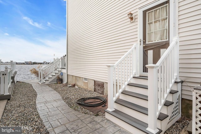 view of home's exterior featuring a water view