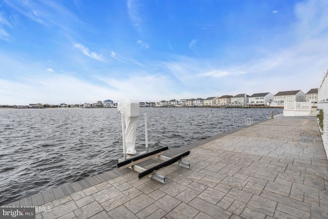 dock area featuring a water view