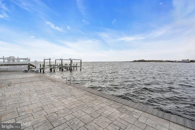 view of dock with a water view