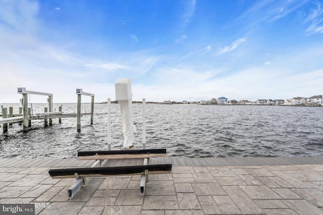 dock area featuring a water view