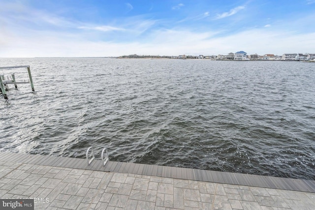 dock area featuring a water view