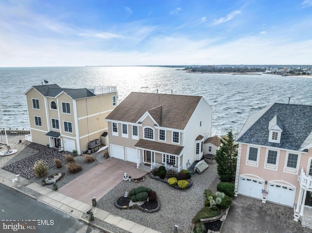 bird's eye view with a water view