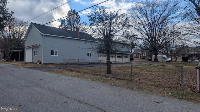 view of home's exterior with a garage