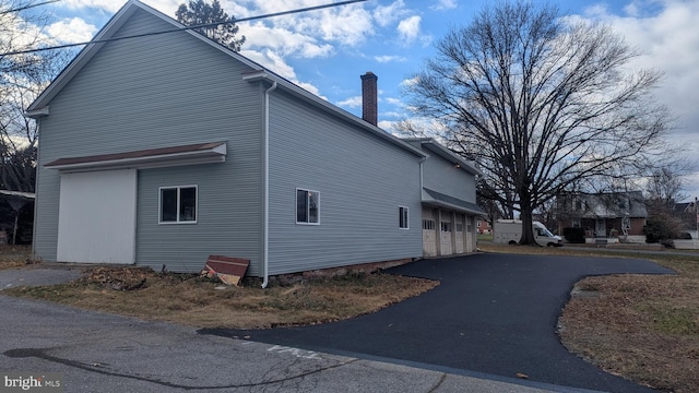 view of home's exterior with a garage