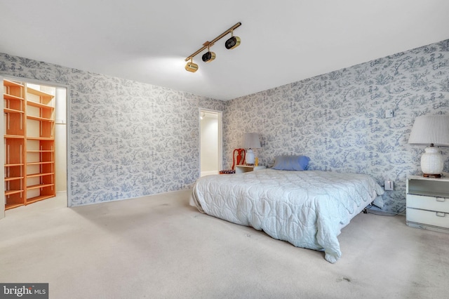 bedroom with light carpet