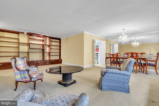 living room featuring a notable chandelier and crown molding